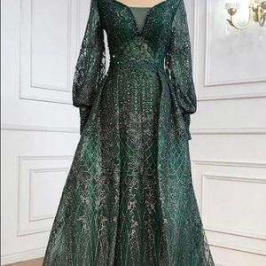 Emerald green gown with attached over skirt